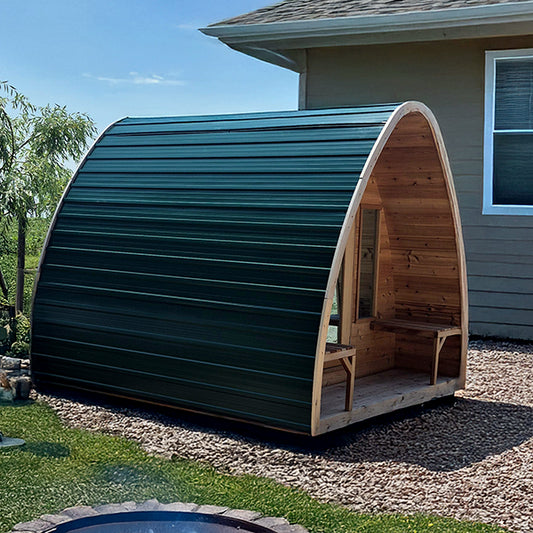 CT MiniPOD sauna fitted with a green metal roof