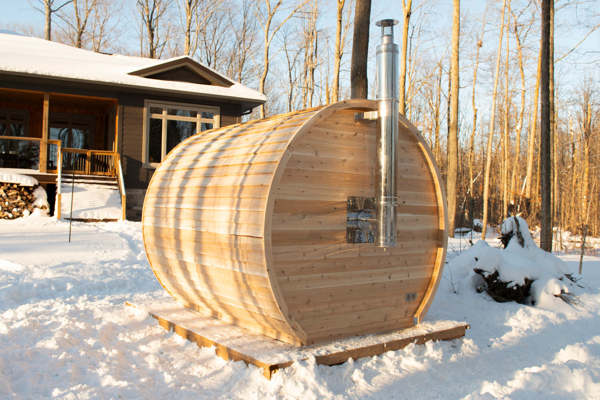 CT Elation sauna rear three-quarter view with the wood-burning chimney fitted