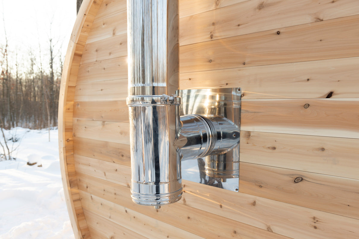 CT Elation sauna chimney passing through the cedar wall, showing the insulated collar