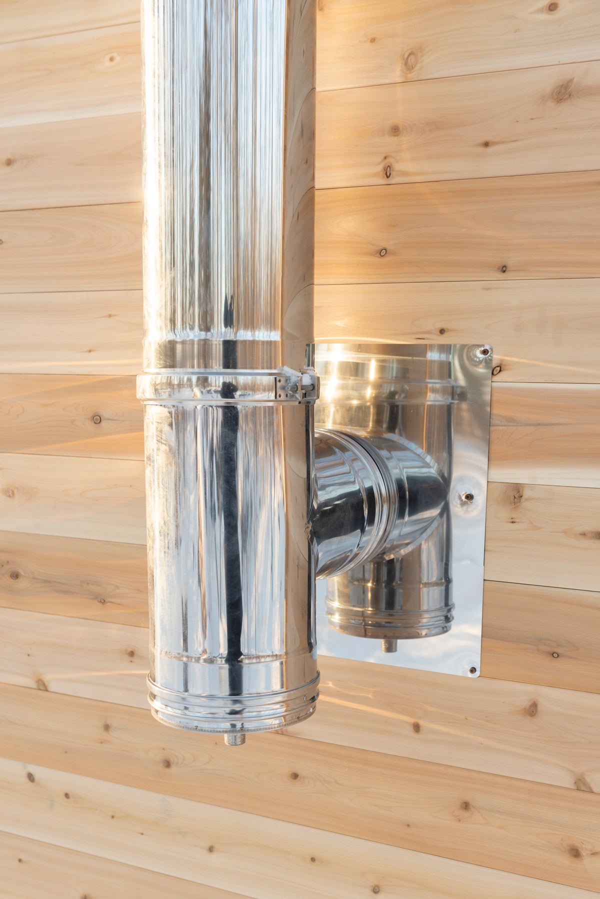 Close view of the CT Elation sauna chimney flashing and stainless flue