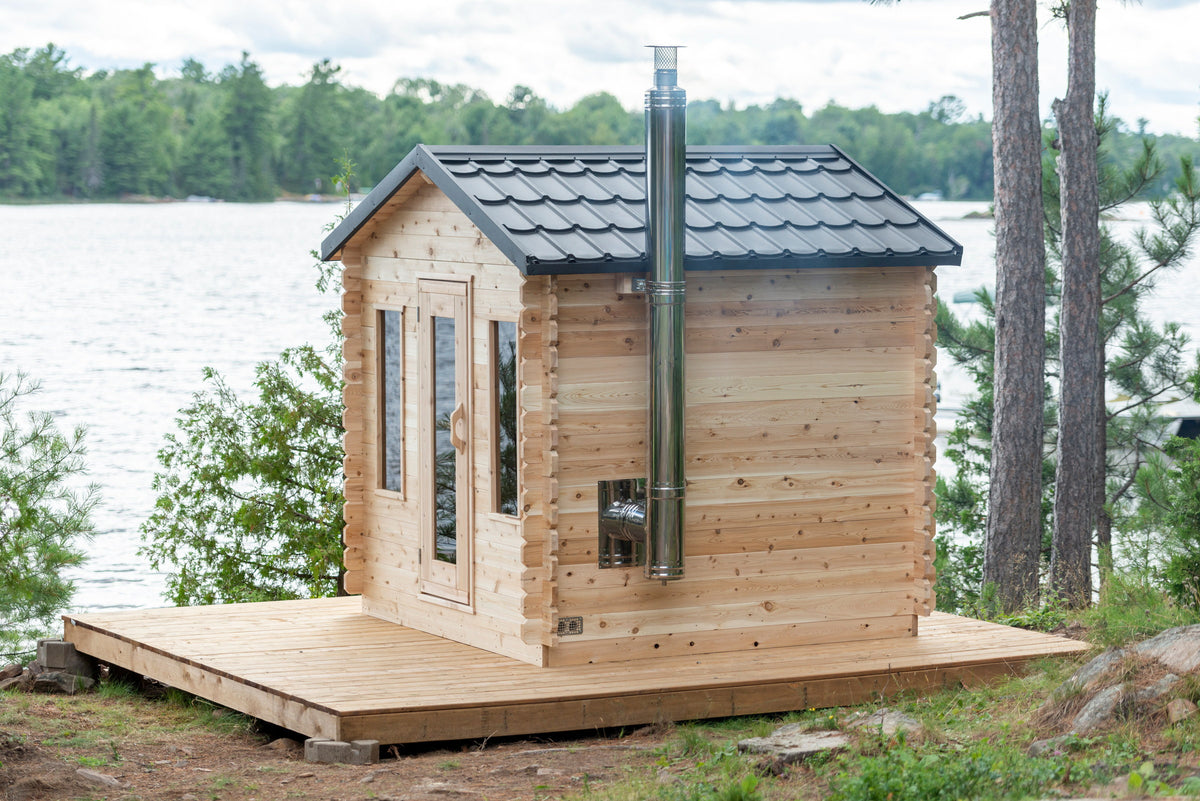 CT Georgian cabin sauna side view on a lakeside deck with the chimney fitted