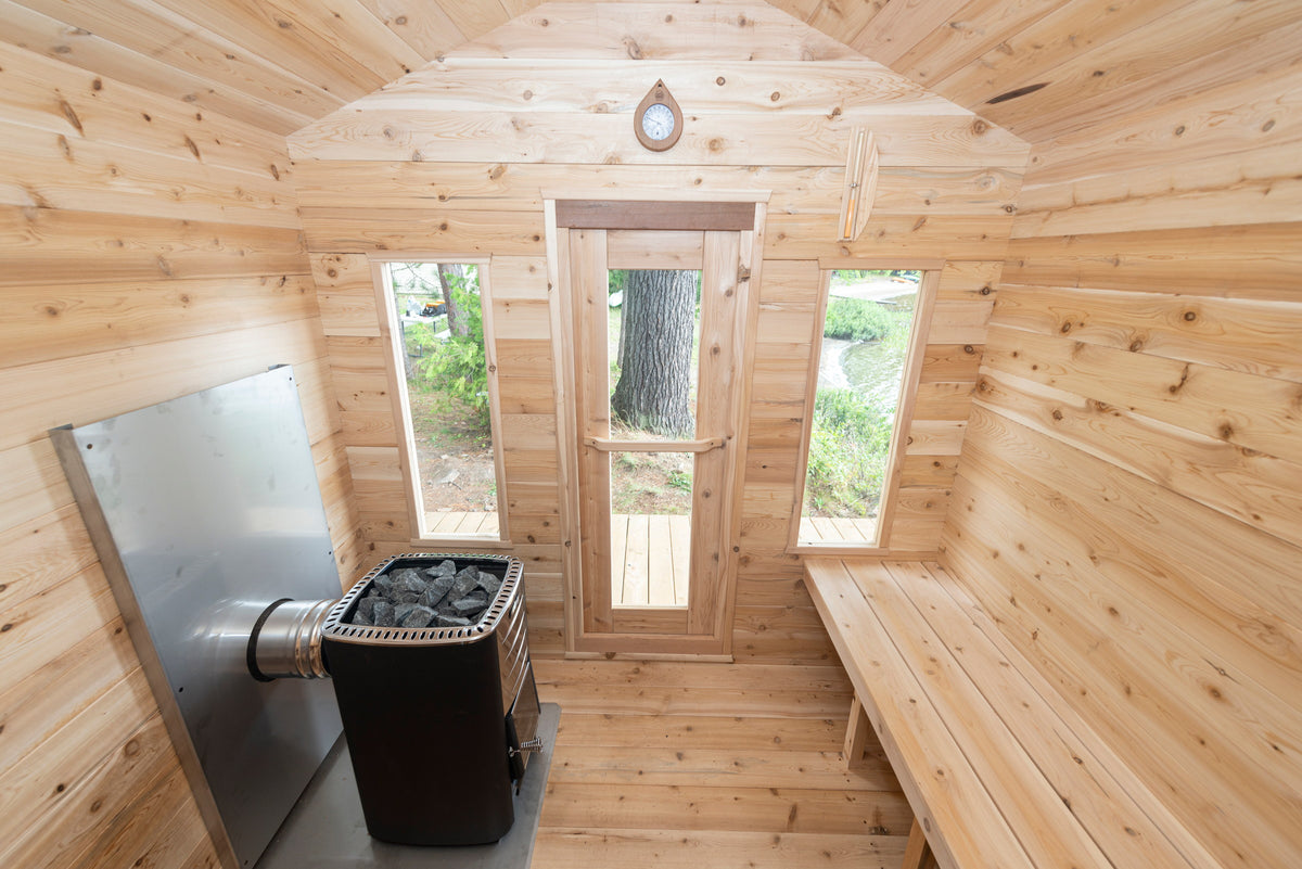 CT Georgian sauna interior looking toward the windows with the electric heater