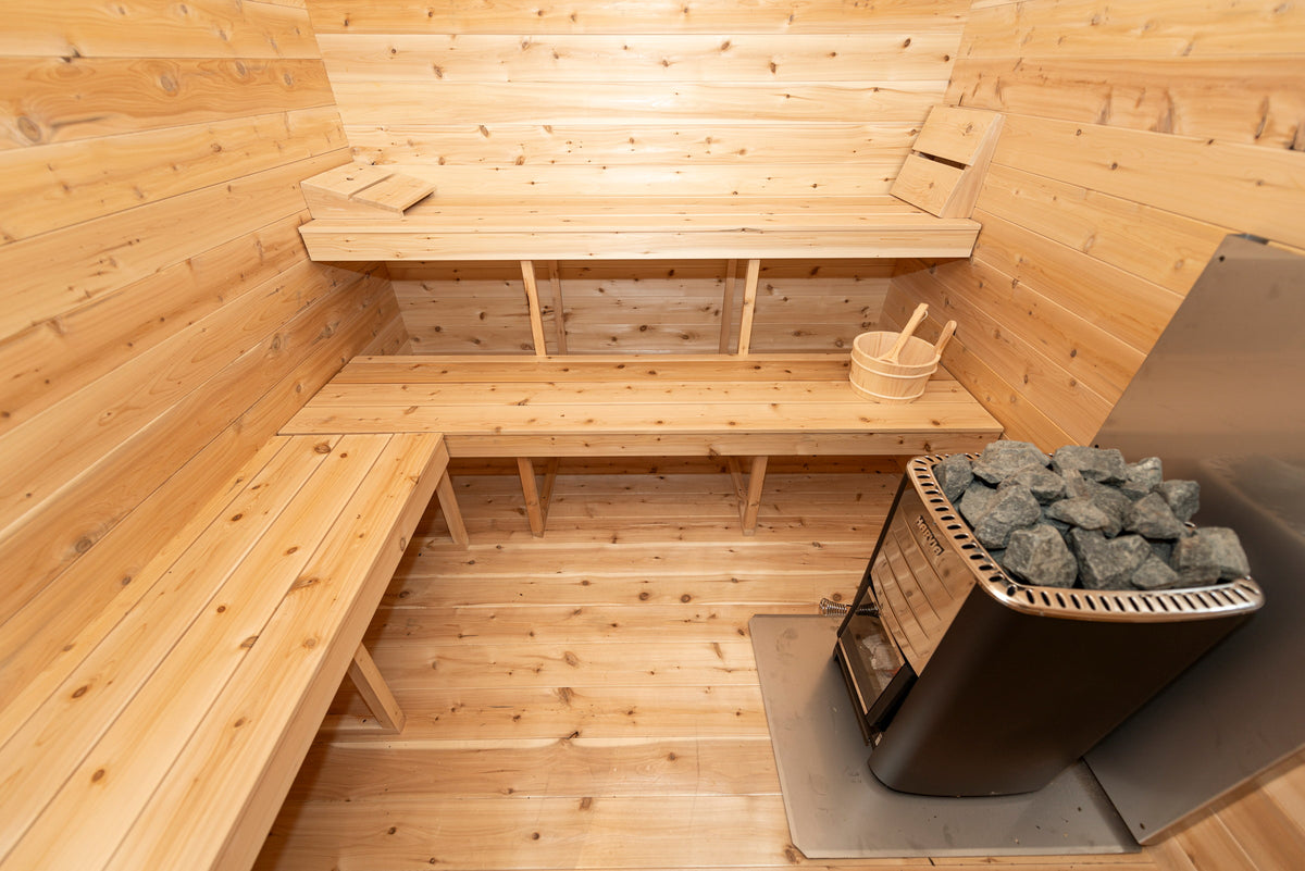 Sauna room of the CT Georgian With Changeroom configuration with heater and cedar benches