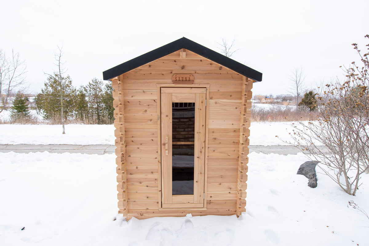 CT Granby cabin sauna in Eastern White Cedar, three-quarter view on open snow