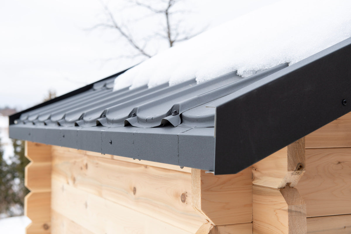 Black metal roof edge and drip trim on the CT Granby cabin sauna