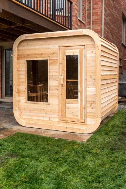 CT Luna sauna exterior three-quarter view in Eastern White Cedar with bronze tempered glass door