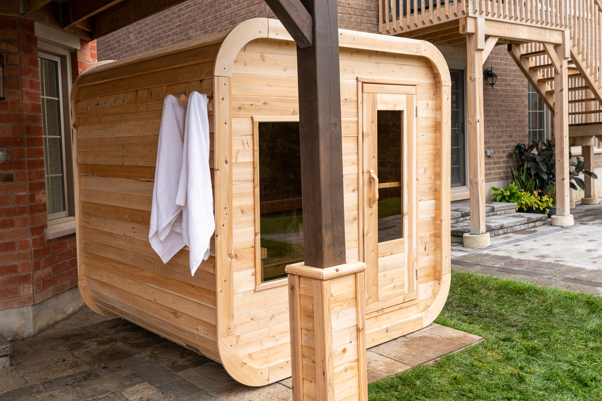 CT Luna sauna installed on a residential patio with towels