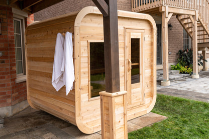 CT Luna sauna installed on a residential patio with towels