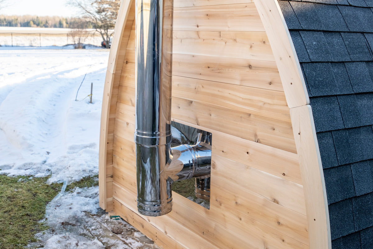 CT MiniPOD sauna exterior with the stainless wood-stove chimney fitted