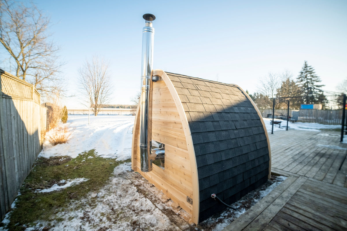 CT MiniPOD sauna on a deck overlooking open water
