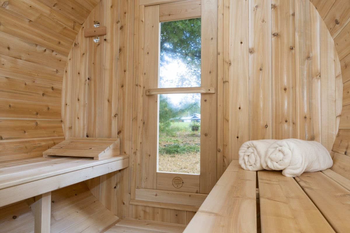 CT Serenity sauna interior with facing cedar benches and rear window
