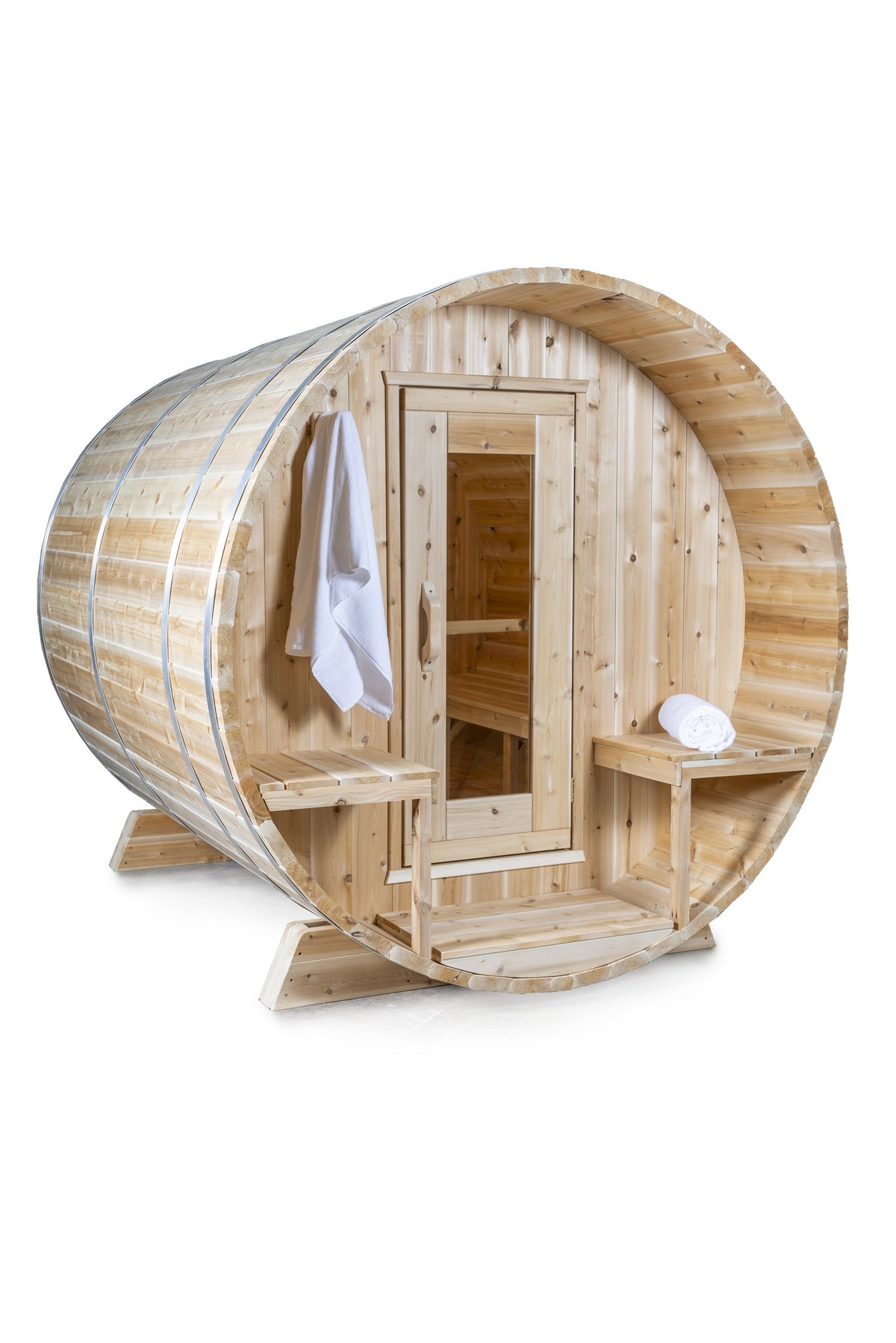 CT Serenity barrel sauna angled studio view showing porch depth and cedar cradles