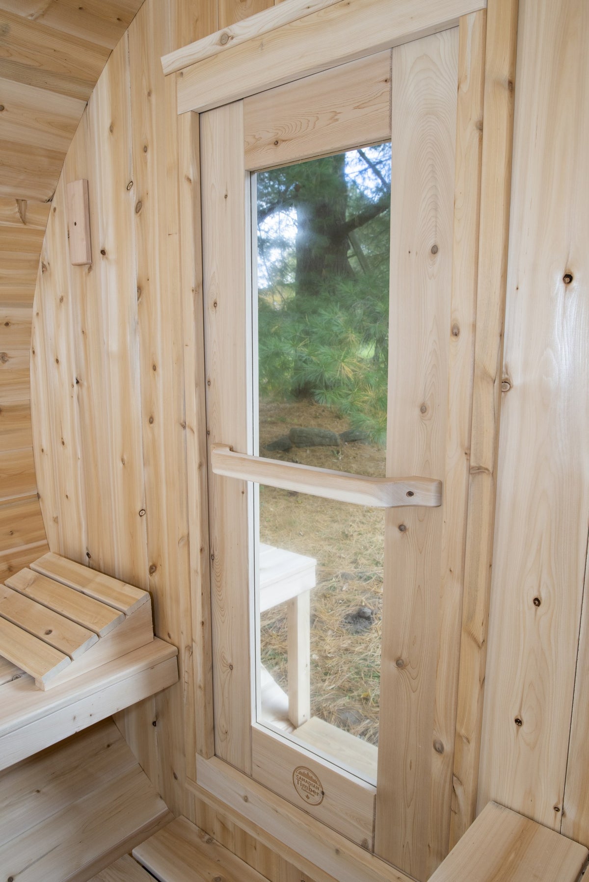 CT Serenity sauna tempered glass door with cedar handle viewed from inside