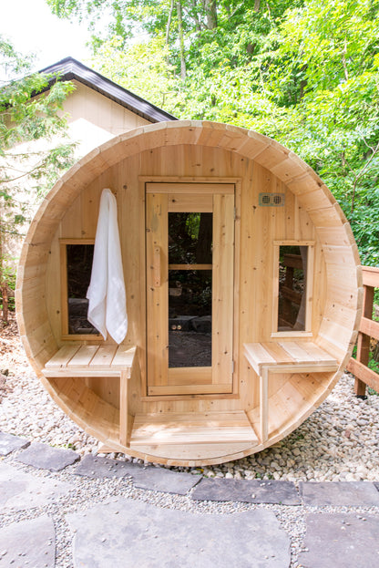 CT Tranquility barrel sauna front elevation showing the porch benches and window door