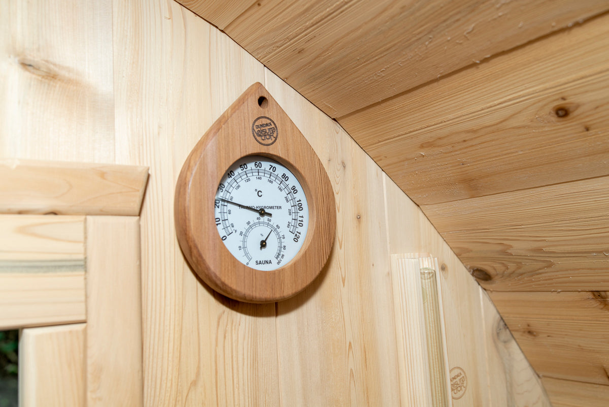 Teardrop cedar thermometer and hygrometer mounted inside the CT Tranquility sauna