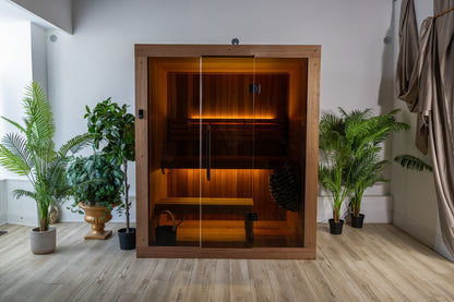 CT Element Loft sauna exterior with interior lighting illuminated