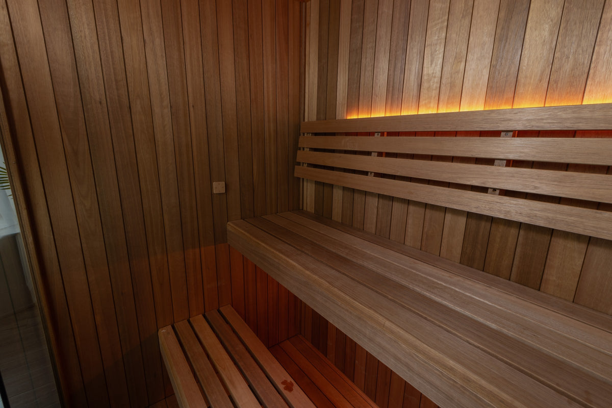 CT Element Loft sauna interior under warm bench lighting