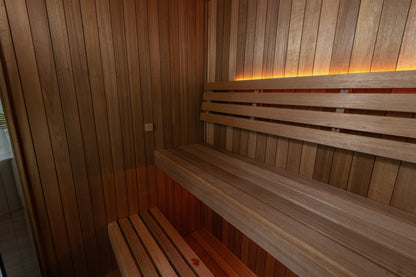 CT Element Loft sauna interior under warm bench lighting