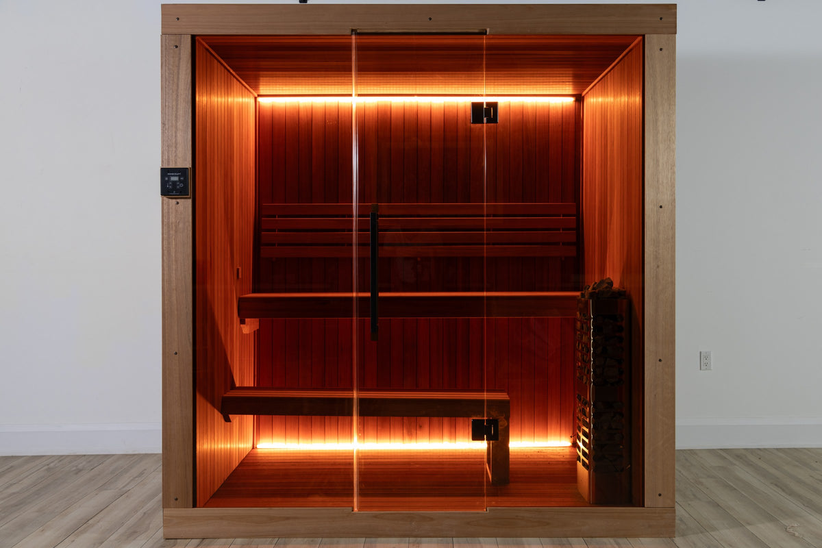 CT Element Studio sauna exterior with interior lighting illuminated