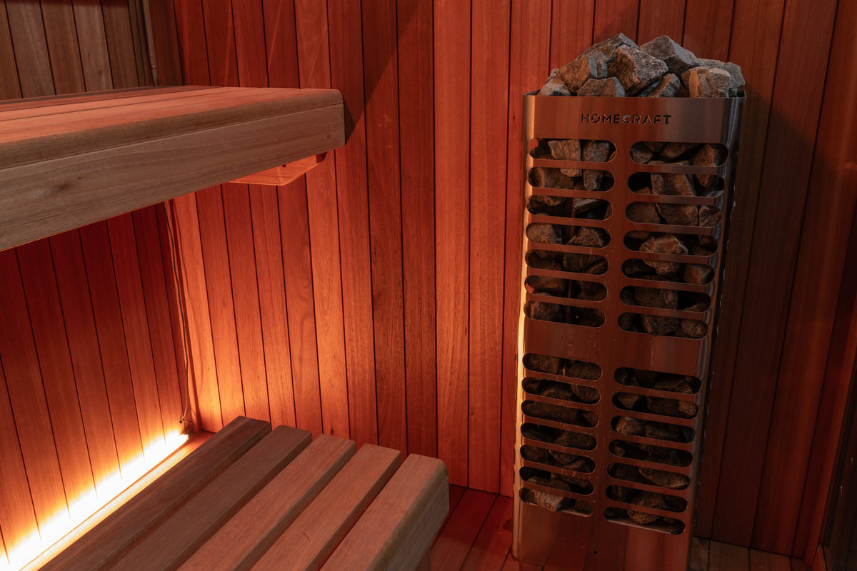 CT Element Studio sauna electric heater and stone tray interior view